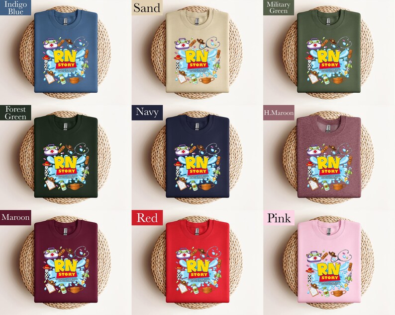 K&ouml;nnte beinhalten: Eine Auswahl an Sweatshirts in verschiedenen Farben, darunter Indigo-Blau, Sand, Waldgr&uuml;n, Marine, Milit&auml;rgr&uuml;n, H.Maroon, Bordeaux, Rot und Pink. Jedes Shirt zeigt eine farbenfrohe Grafik mit dem Text "RN STORY" und medizinischen Illustrationen.
