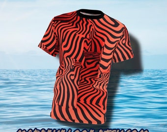 May include: A black and orange t-shirt with a wavy, abstract pattern. The shirt has short sleeves and a crew neck.