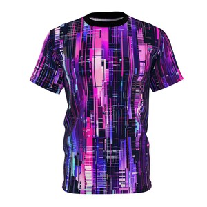 May include: A short-sleeved t-shirt with a colorful abstract design featuring vertical lines and geometric shapes in shades of pink, purple, and blue on a black background.