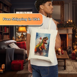 Awesome Kid Riding a Dinosaur Cotton Canvas Tote Bag - Reusable Bag with Kid Riding A Dino on Christmas Morning