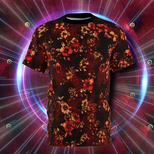 May include: A black t-shirt with a red and orange floral print.