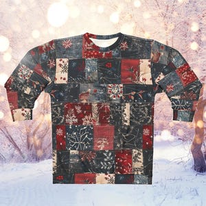 May include: A long-sleeved shirt with a patchwork design featuring a variety of colours and patterns, including red, blue, and green. The shirt has a crew neck and is made of a soft, comfortable fabric.