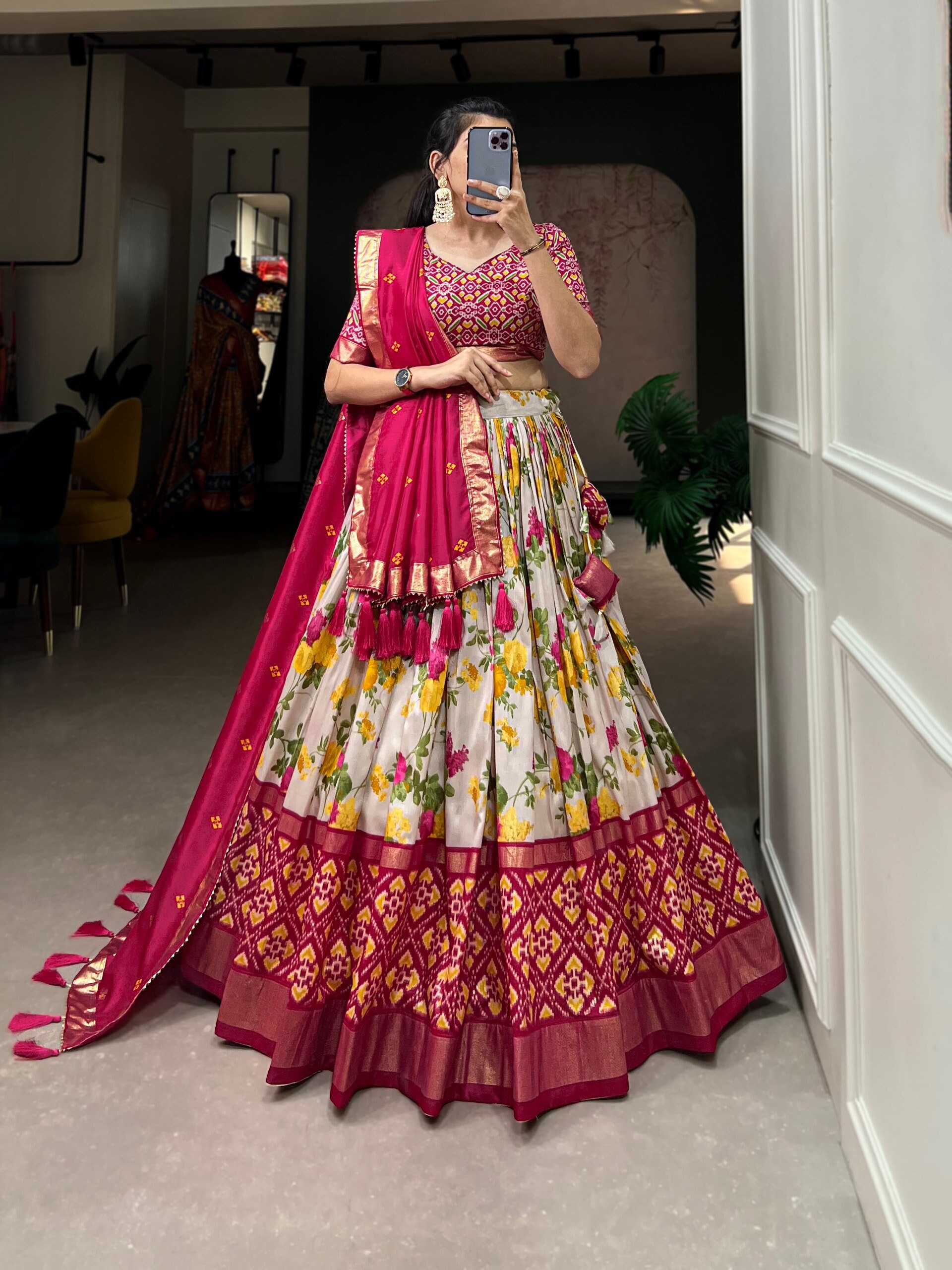 Bridal lehenga paired with peach color heavily embellished choli
