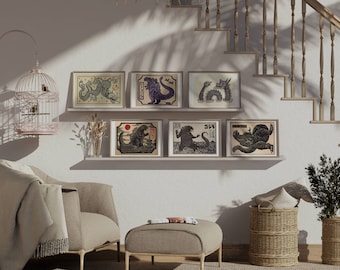 May include: A set of six framed prints featuring black and white illustrations of dragons and monsters. The prints are displayed on a white wall with a wooden staircase in the background.