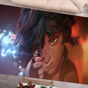 以下が含まれることがあります： 青い髪と茶色の目をしたキャラクターのクローズアップ。キャラクターは光る青い武器を持っています。背景は暖色系のオレンジです。