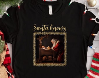 Santa Praying to Baby Jesus T-Shirt, Festive Christmas Tee, Holiday Religious Gift, Christian Santa Claus Shirt, Festive Xmas Apparel