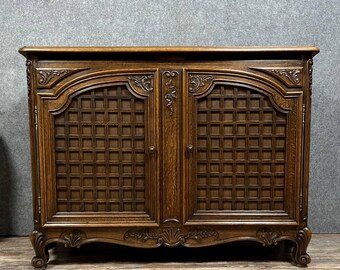 buffet de boiserie a double fond secret Louis XV galbé en chêne circa 1900