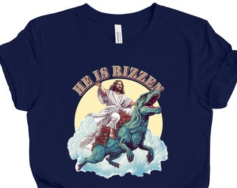 He Is Rizzen T-shirt | Jesus Riding A Dinosaur T-shirt | Funny Trex Shirt | Funny Christian Shirt | Funny Meme Shirt | Funny Jesus Shirt