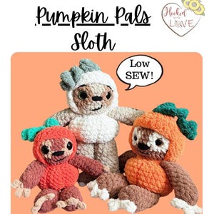 May include: Three crocheted sloth dolls wearing pumpkin and leaf costumes. The dolls are in shades of orange, brown, and white. The text "Pumpkin Pals Sloth" and "Low Sew!" are visible.