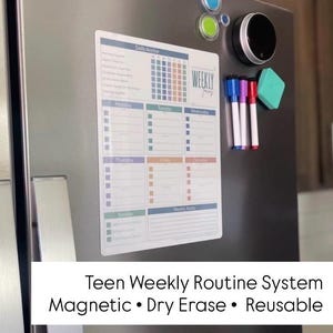 May include: A magnetic, dry-erase weekly routine system for teens, affixed to a refrigerator. The calendar features daily and weekly sections with color-coded boxes. Includes dry-erase markers and an eraser. Text on the image reads: Teen Weekly Routine System.