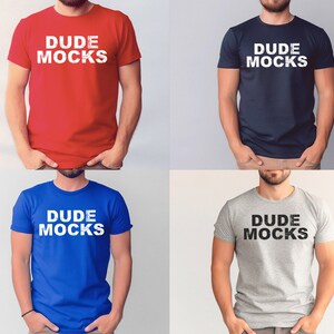 May include: Four t-shirts in different colors with the text "DUDE MOCKS" printed in white on the red, blue, and gray shirts and in black on the navy shirt.