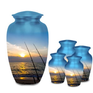 May include: A set of blue urns with a fishing scene. The urns feature a sunset over the ocean with fishing rods. The urns are different sizes, with a large urn and four smaller urns.