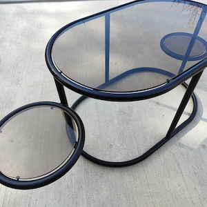 Mid-century black glass swivel coffee table/by Milo Baughman/swivel coffee table/70s