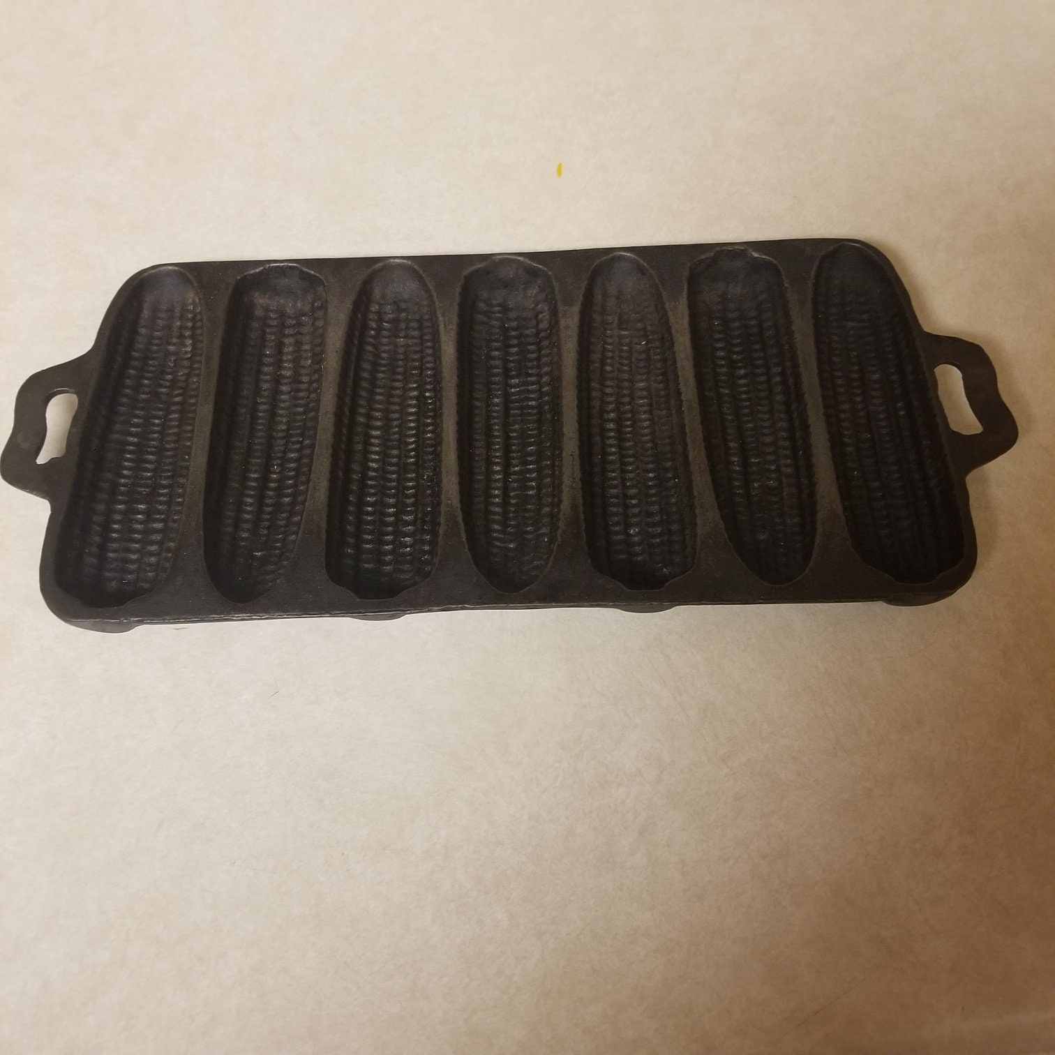 vintage-cast-iron-corn-bread-baking-pan-7-stick-7s0-etsy