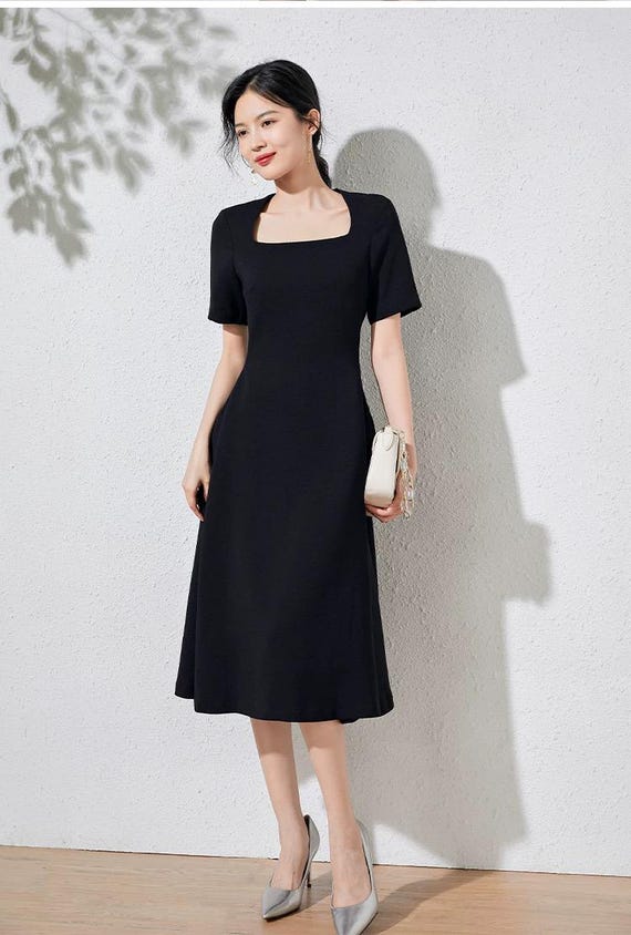 Short black swing dress sale