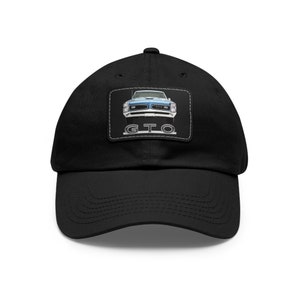 May include: A black baseball cap with a patch featuring a blue 1968 Pontiac GTO muscle car with the text "GTO" in white.