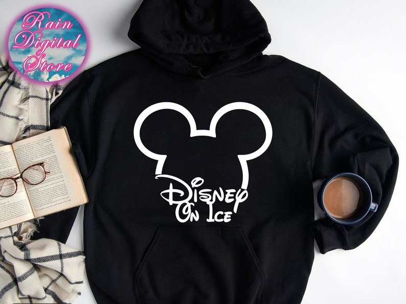 May include: Black hoodie with a white Mickey Mouse silhouette and the text "Disney on Ice" printed on the front.
