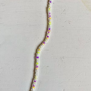 White, green, purple and orange necklace