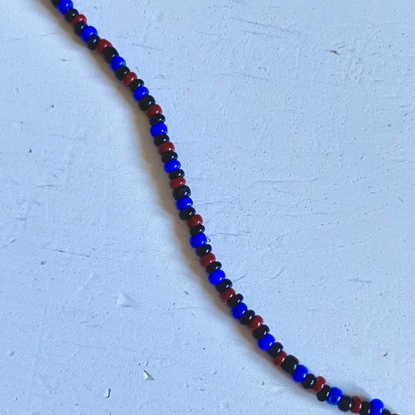 Collier noir bleu et rouge