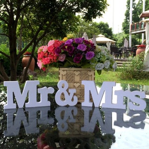 Enhance your wedding with our 'Mr & Mrs' sign