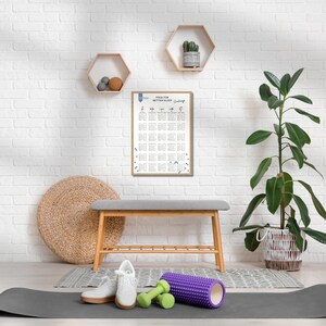 May include: A framed white poster titled Yoga for Better Sleep Challenge with a grid of daily exercises, a gray bench, a green foam roller, two small green dumbbells, and white sneakers on a dark gray yoga mat in front of a white brick wall.