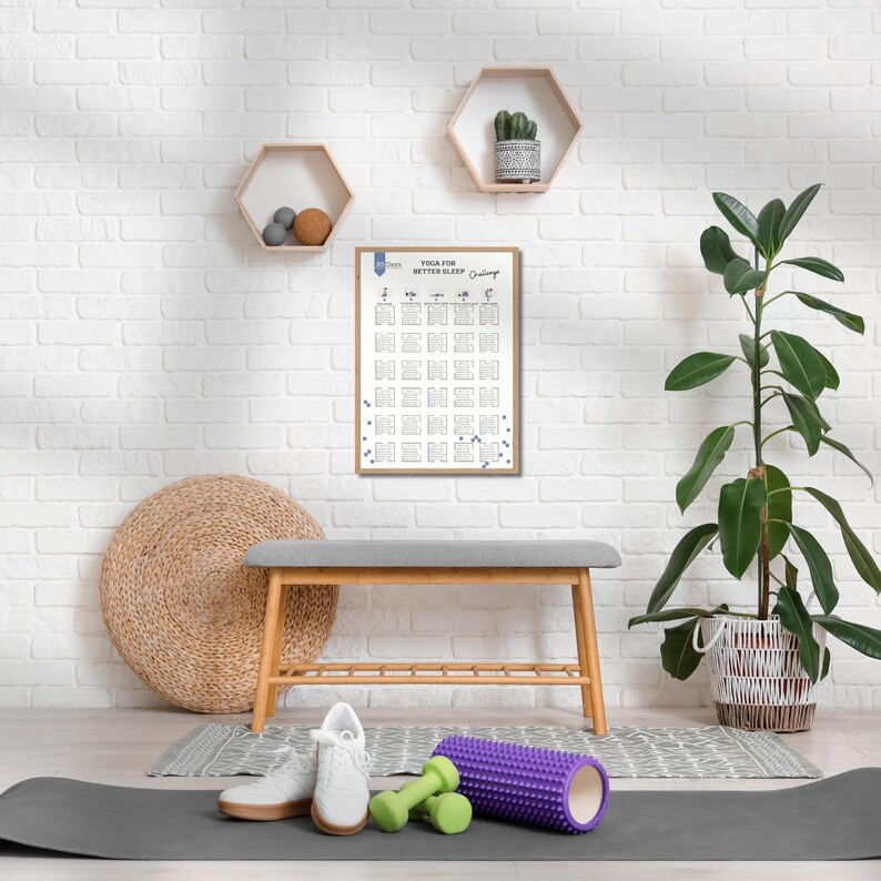 May include: A framed white poster titled Yoga for Better Sleep Challenge with a grid of daily exercises, a gray bench, a green foam roller, two small green dumbbells, and white sneakers on a dark gray yoga mat in front of a white brick wall.