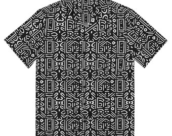 May include: Black and white short-sleeved button-up shirt with a geometric pattern.
