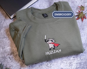 Embroidered Huzzah Raccoon with Sword Shirt Embroidered Funny Medieval Raccoon Sweater Comfort Colors Renaissance Faire Raccoon Gift