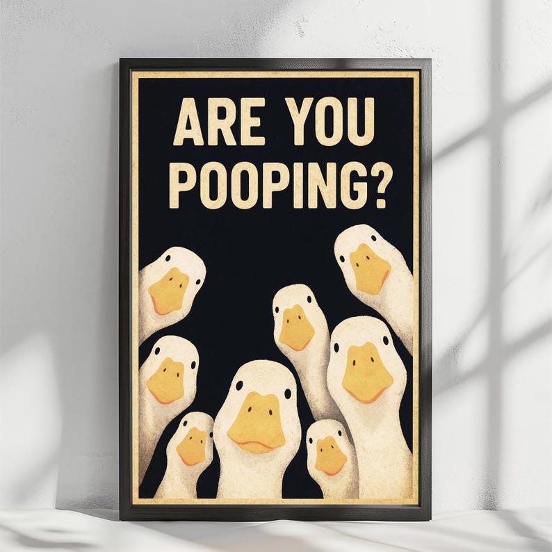 The image is a framed poster with a cartoon-style illustration of ducks, accompanied by the text "ARE YOU POOPING?"