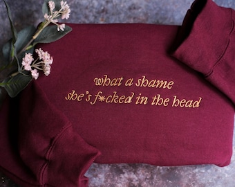 Embroidered She's fucked in the head Sweatshirt, Champagne problems, Subtle merch, mental health shirt, gift for Swiftie