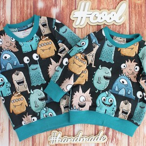 Kinder Pullover lustige Monster Dunkelblau Petrol Gr. 74 & 86