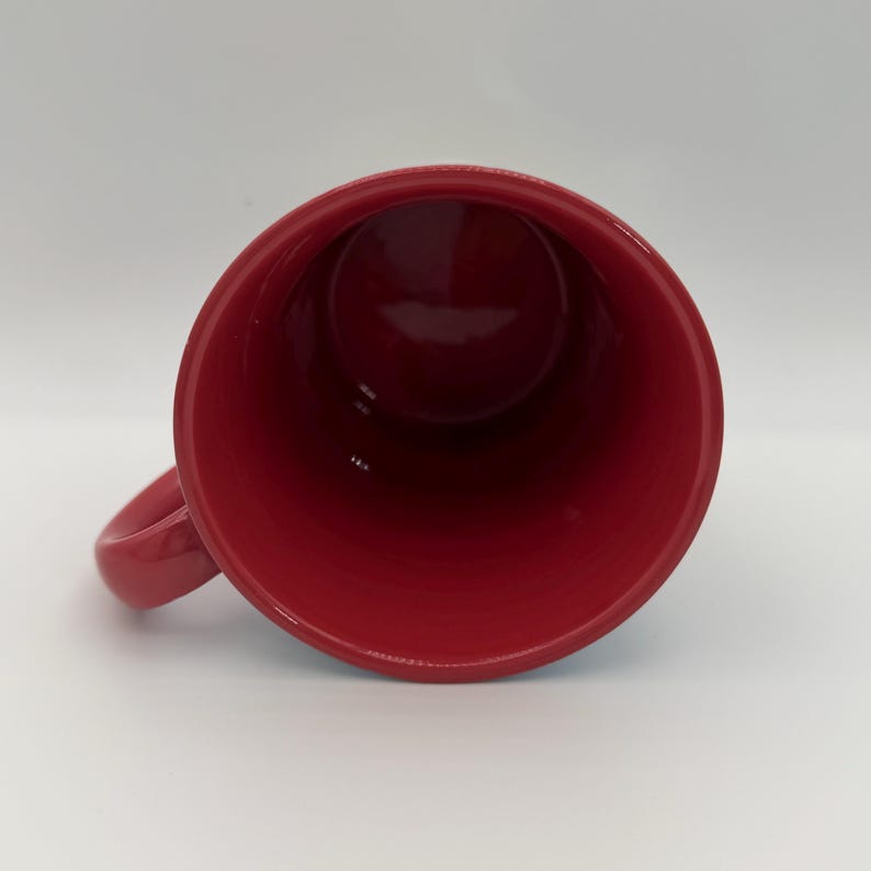 May include: A set of three ceramic mugs with a speckled, matte finish. The mugs are in shades of cream, light gray, and dark gray. Each mug has a simple, minimalist design, perfect for coffee or tea.