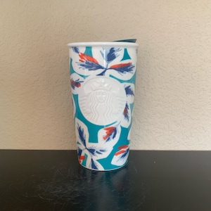 STARBUCKS TRAVEL MUG with Embossed Mermaid Face Floral Ceramic Coffee / Tea Mug with Plastic Lid 12 oz.  - Preowned