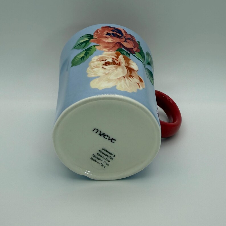 May include: A set of three ceramic mugs with a speckled, matte finish. The mugs are in shades of cream, light gray, and dark gray. Each mug has a simple, minimalist design, perfect for coffee or tea.