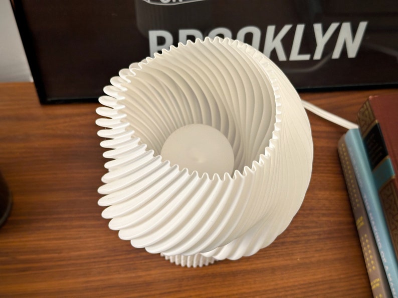 A detail photo of the Flourish Lamp, highlighting the shade's pleats.