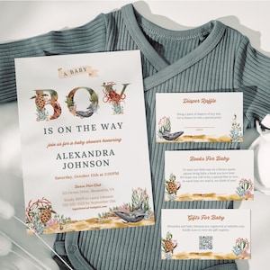 May include: A baby shower invitation with an ocean theme. The invitation features a watercolor illustration of a whale, sea turtles, coral, and seashells. The text on the invitation reads "A Baby Boy is on the Way" and includes the name Alexandra Johnson, the date and time of the shower, and the address. There are also three cards for a diaper raffle, books for baby, and gifts for baby.