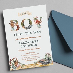 Puede incluir: Una invitación a una fiesta de bienvenida al bebé con una ilustración acuarela azul, verde y naranja de la palabra "BOY" hecha de criaturas marinas. El texto dice "A Baby Boy is on the Way, join us for a baby shower honoring Alexandra Johnson, Saturday, October 12th at 2:00PM, Barca Pier Club, 123 Ocean Drive, Alexandria, VA, Kindly RSVP to Laura Johnson, 555-555-5555 by September 21st, registered at babylist.com".