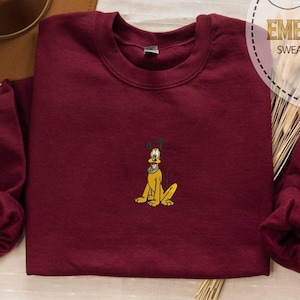 May include: A set of three ceramic mugs with a speckled, matte finish. The mugs are in shades of cream, light gray, and dark gray. Each mug has a simple, minimalist design and a rounded handle.