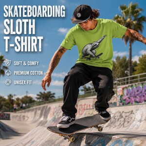 May include: A lime green t-shirt featuring a black and white graphic of a sloth riding a skateboard. The shirt includes text that reads SKATEBOARDING SLOTH T-SHIRT, SOFT & COMFY, PREMIUM COTTON, and UNISEX FIT. The garment is worn with black pants.