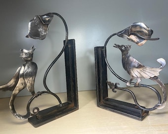 Bird and Calla Lily Bookends made of Stainless Steel and Iron and are heavy enough for the biggest of books. Great for home office