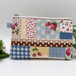 Cute strawberry patch pattern zipper pouch, made in Japan, perfect for makeup or small items. C