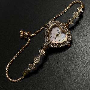 montre femme dorée vintage, montre coeur, montre femme délicate, montre-bracelet, montre perle, montre en or, montre en or, montre vintage, petit cadran