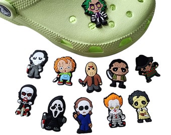 May include: Set of 10 horror movie character shoe charms. The charms are made of black rubber and feature various characters from popular horror movies, including Freddy Krueger, Jason Voorhees, and Pennywise.