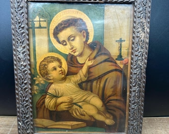 Antieke prent van Sint Antonius van Padua met het kindje Jezus, ingelijste katholieke devotionele kunst, religieuze lithografie uit het begin van de 20e eeuw.