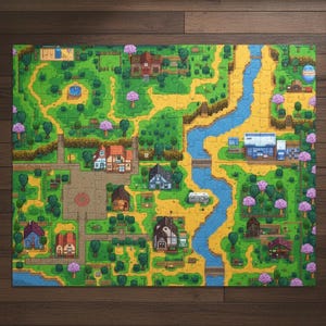 Peut inclure: Un puzzle terminé représentant une vue de dessus colorée d'une ville avec une rivière, des bâtiments, des arbres et des routes. Le puzzle est posé sur un fond en bois foncé.