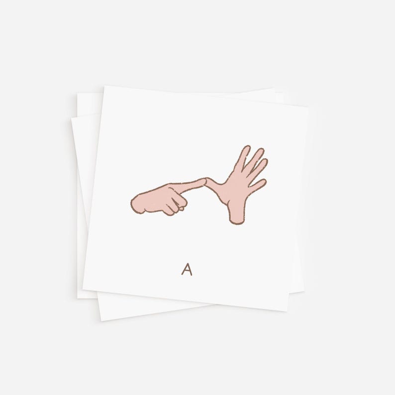 A minimalist stack of flash cards highlighting the AUSLAN sign language gesture for the letter A, featuring pastel pink hands on a white background. Suitable for teaching individual letters in sign language.