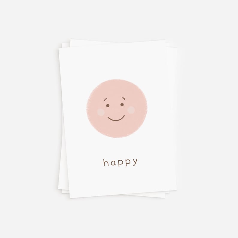 Stacked rainbow feelings flash cards with the happy card on top, showcasing a smiling face in pastel pink, ideal for emotional learning activities.