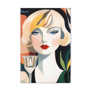May include: Art Deco style canvas print featuring a woman with blonde hair, blue eyes, and red lipstick. She holds a glass, set against a colorful abstract background with orange, black, and green hues. The artwork evokes a vintage, glamorous aesthetic.