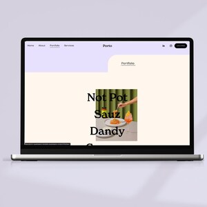 May include: A laptop computer screen displaying a website with the text "Not Pot Sauz Dandy" and a photo of a plate of spaghetti with a hand holding a fork over it.