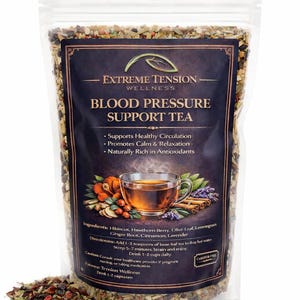 May include: A clear bag of loose leaf tea labeled "Extreme Tension Wellness Blood Pressure Support Tea." The label lists ingredients and directions. The tea is a mix of herbs and spices, including hibiscus and cinnamon.